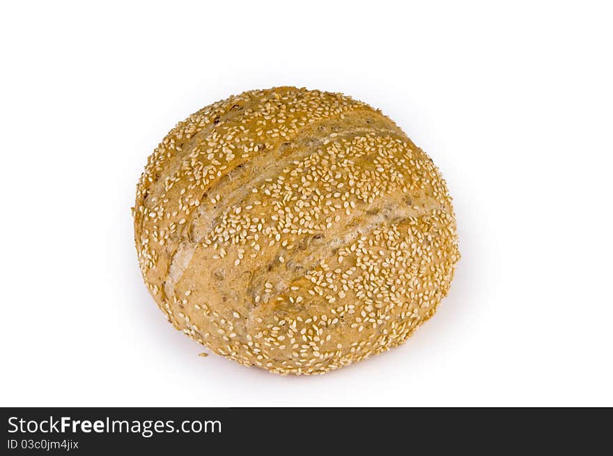 Bread sprinkled with sesame seeds on a white background. Bread sprinkled with sesame seeds on a white background