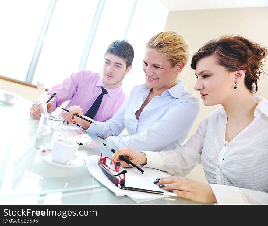 Group Of Business People At Meeting