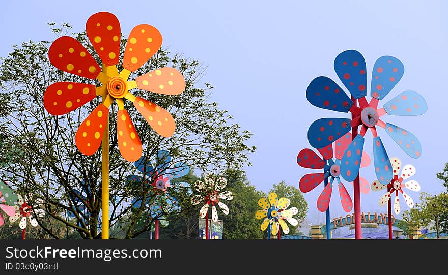 Colorful windmill in amusement park