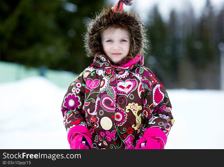 Winter Portrait Of Adorable Child Girl In Jumper