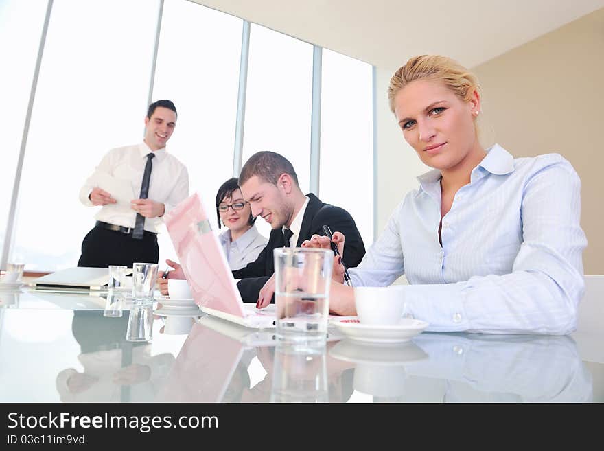 Group Of Business People At Meeting