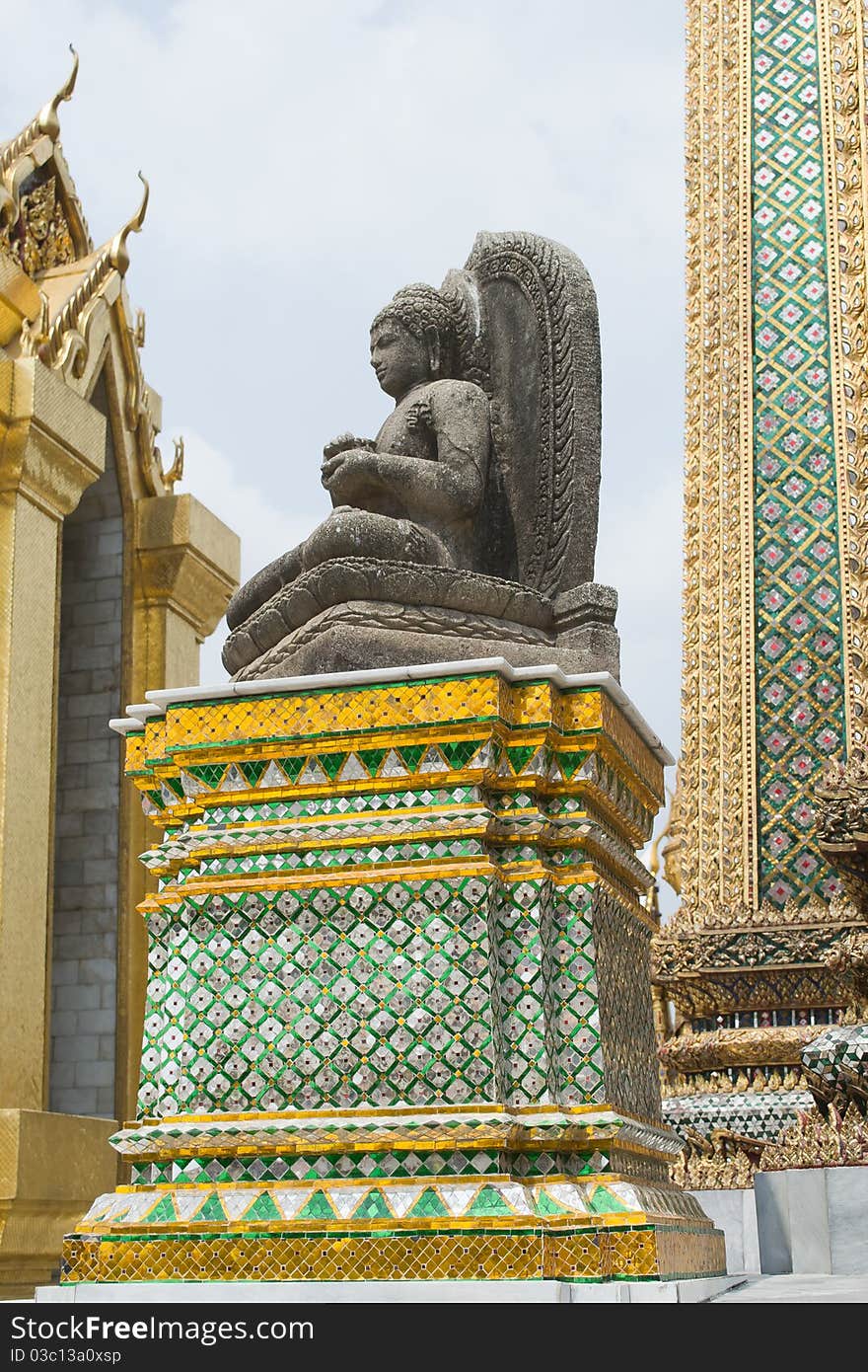 Stone Buddha at Wat Phra Kaew is located in Bangkok, Thailand. Stone Buddha at Wat Phra Kaew is located in Bangkok, Thailand