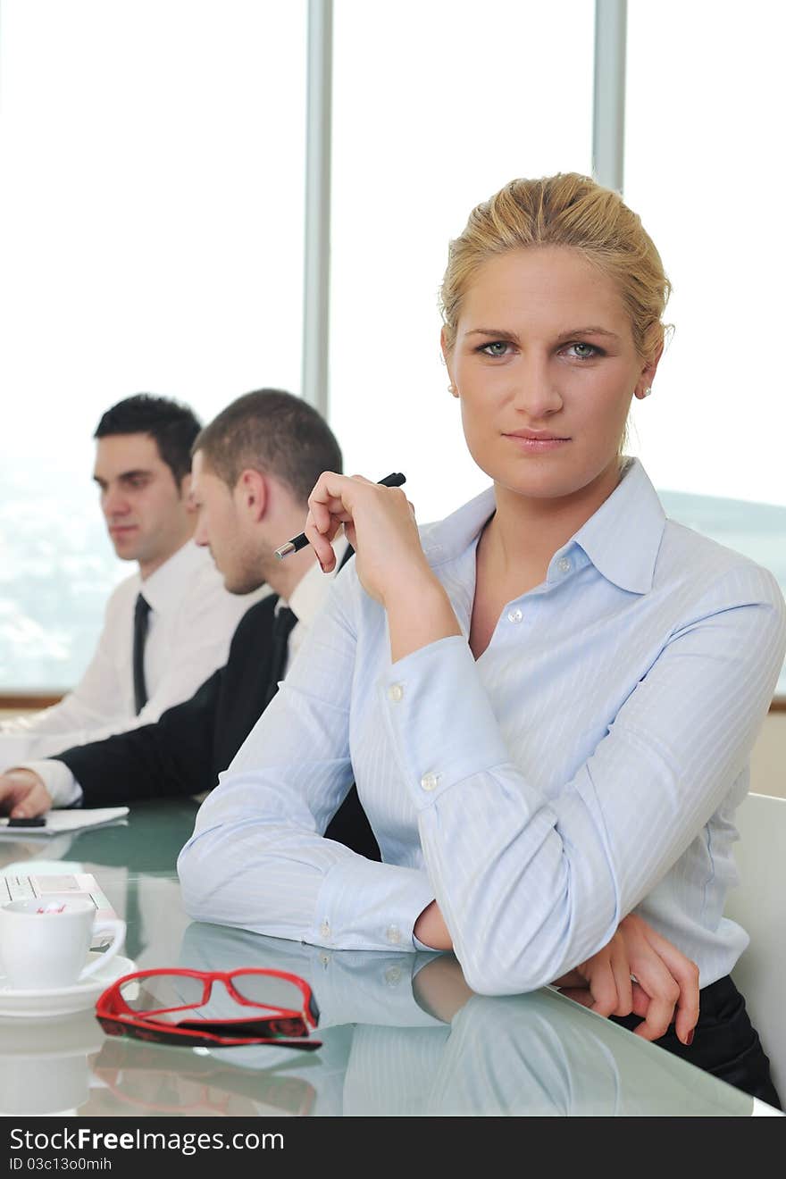 Group Of Business People At Meeting