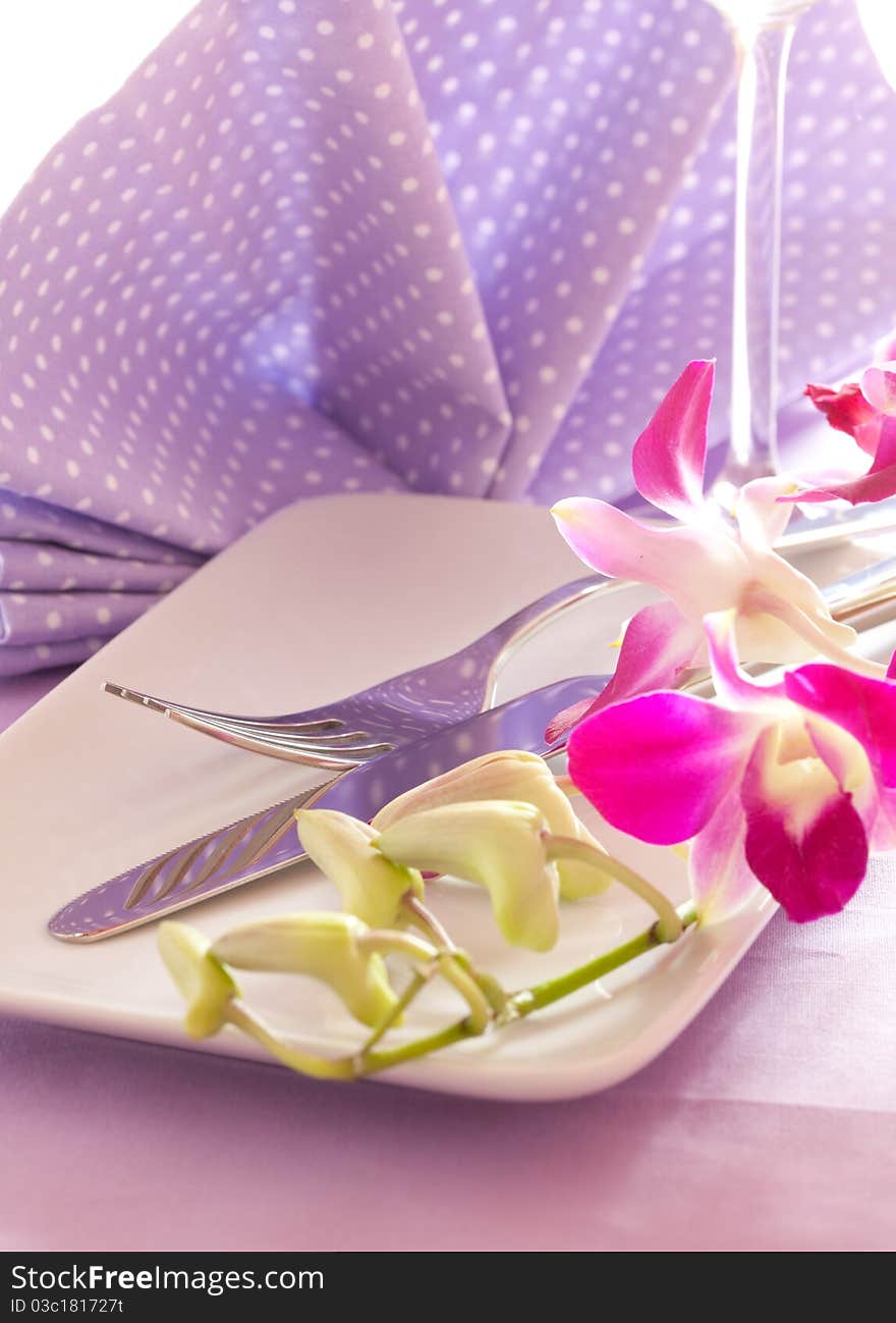 Table setting with flower and cutlery