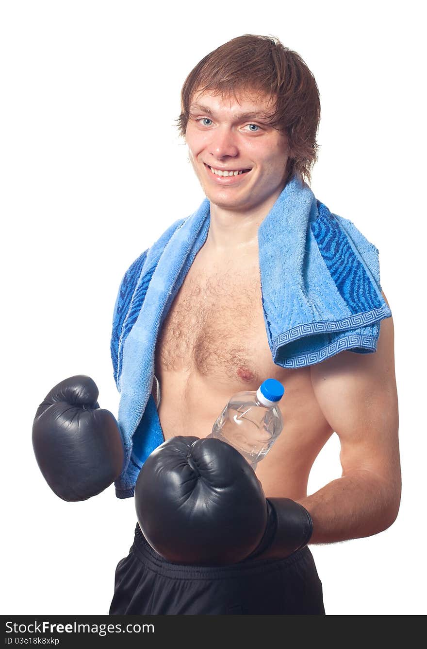 Young caucasian Man boxer with black boxing gloves on white background. Studio shot.