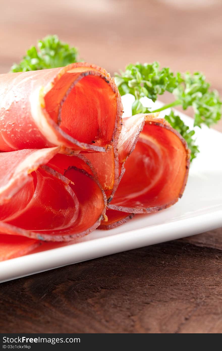 Gammon on a plate with parsley