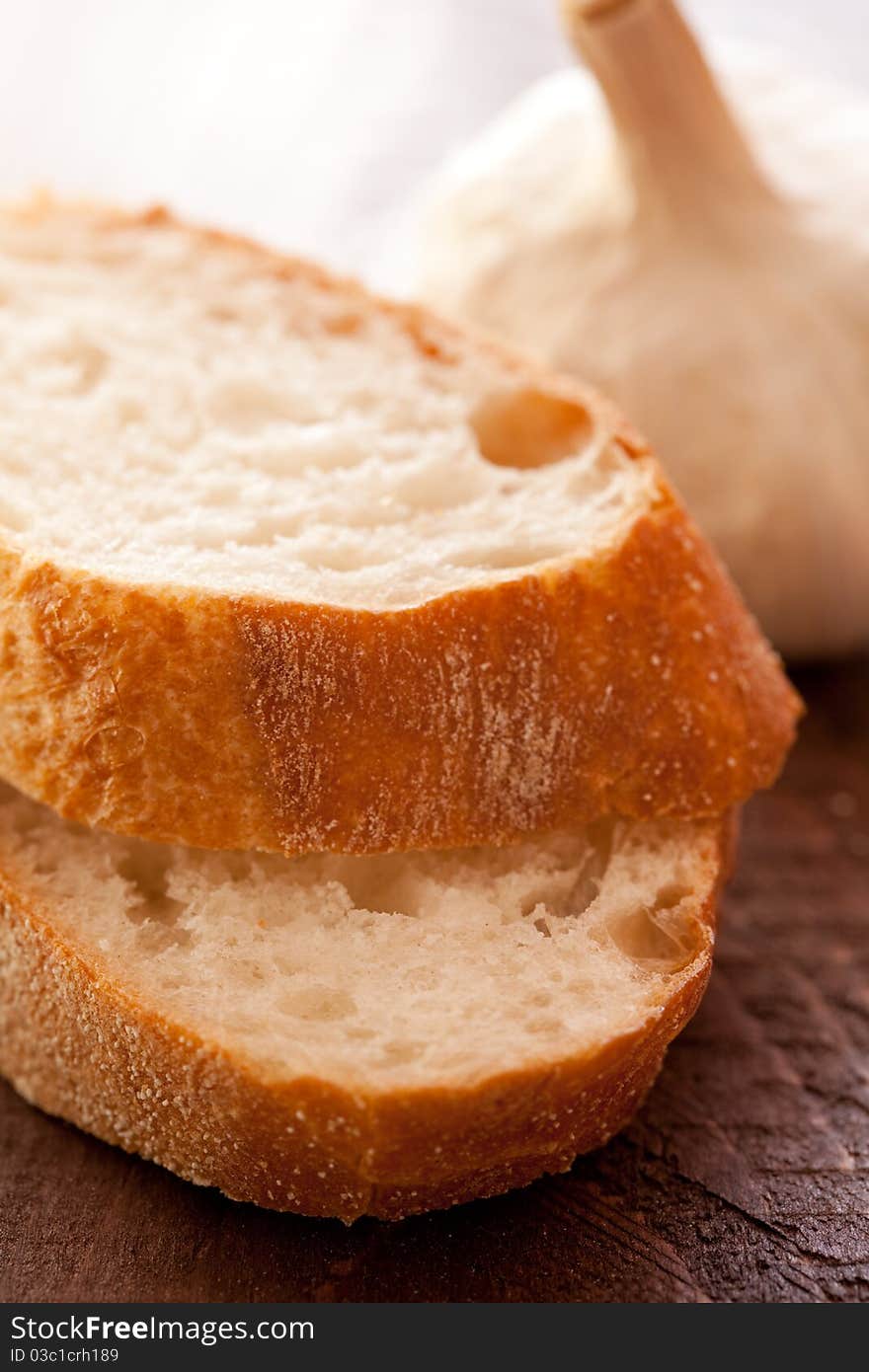 Fresh baguette bread on table