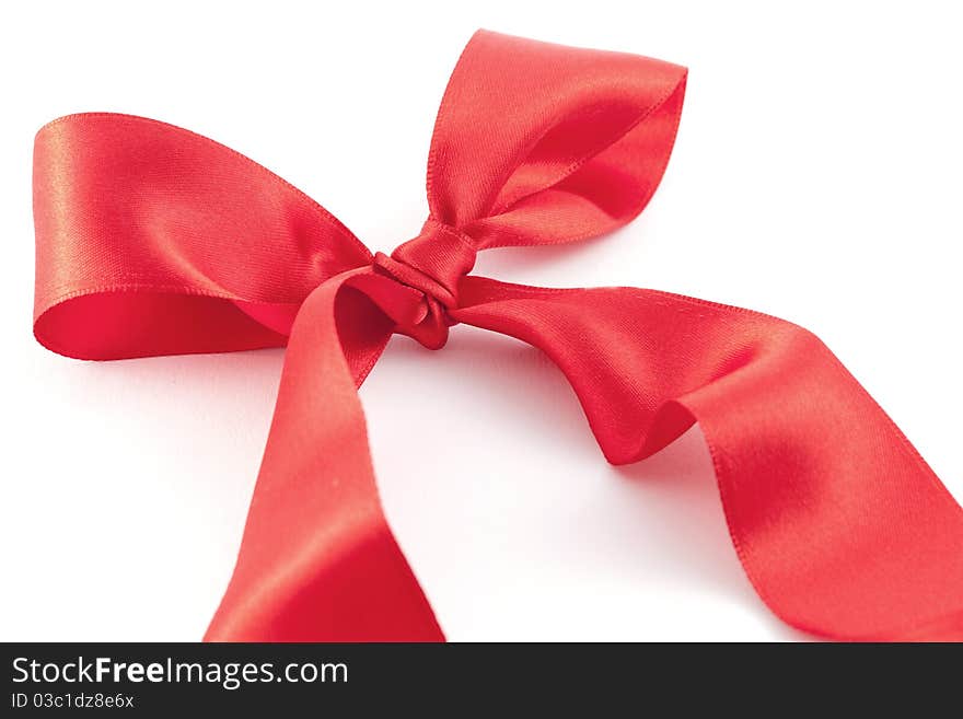 Red ribbon isolated on white background