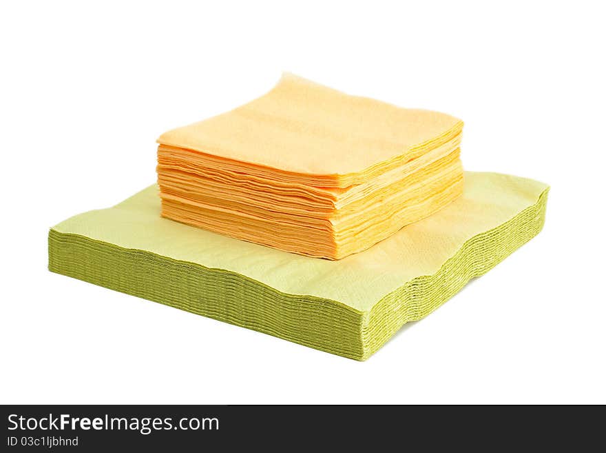 Green and yellow napkins isolated on a white background. Green and yellow napkins isolated on a white background.