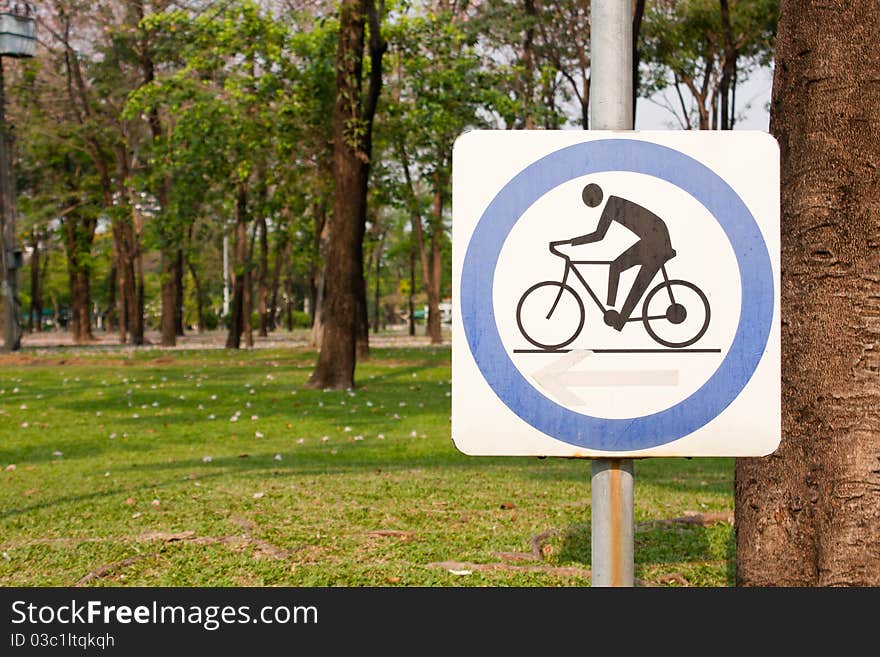 A symbol, people are cycling. On background. A symbol, people are cycling. On background