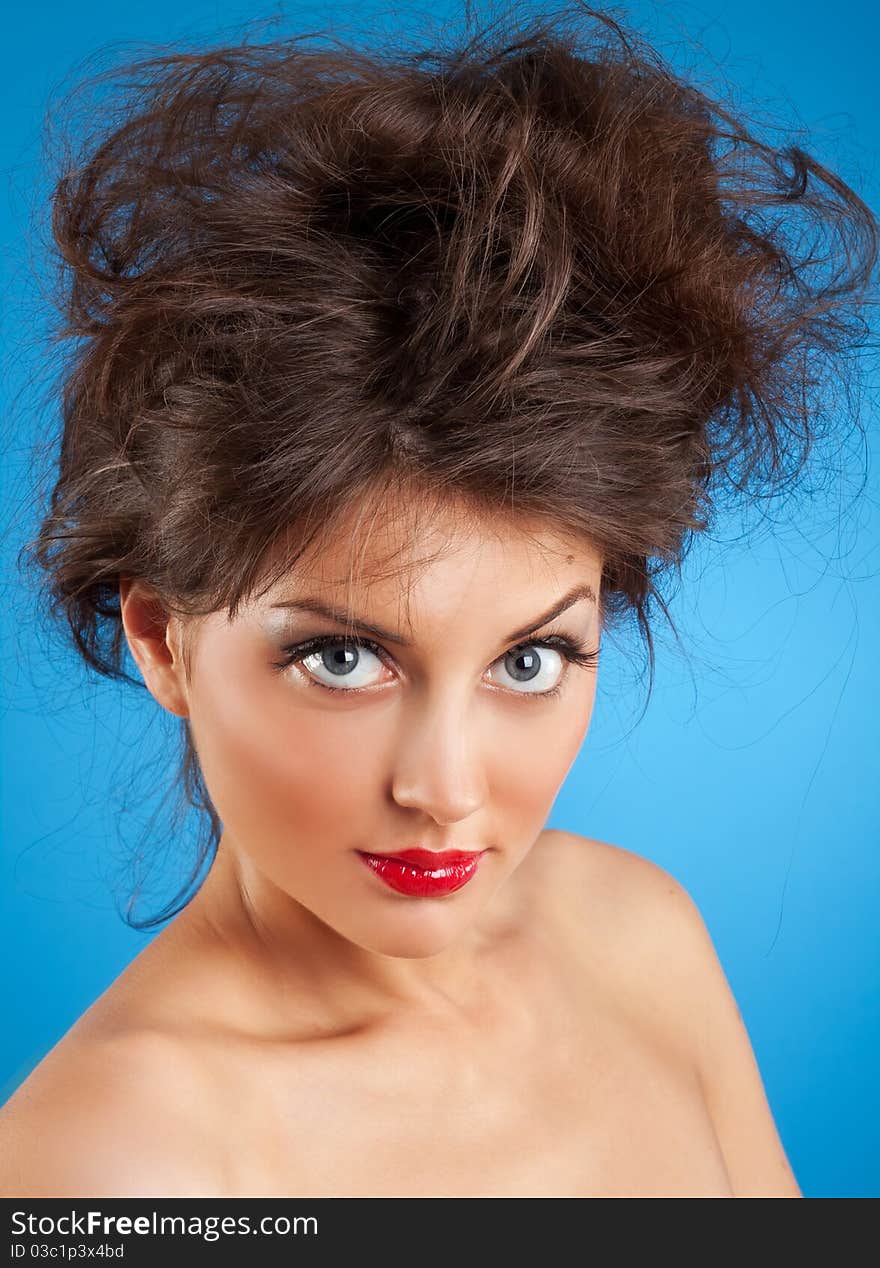 Beautiful woman with crazy hairstyle