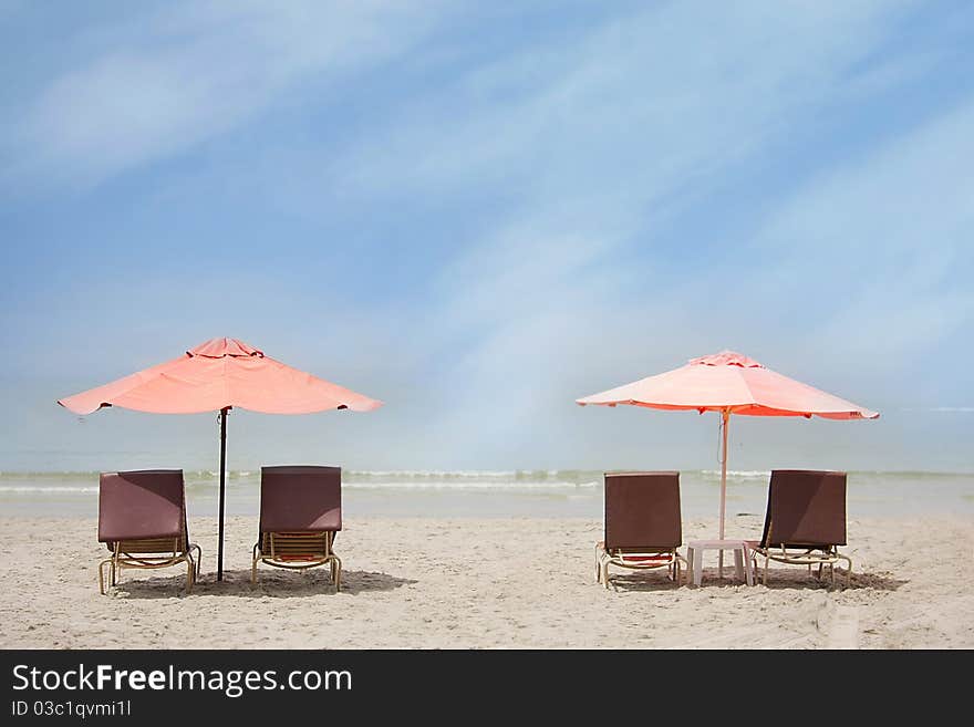 Chairs and umbrella on tropical beach. Chairs and umbrella on tropical beach