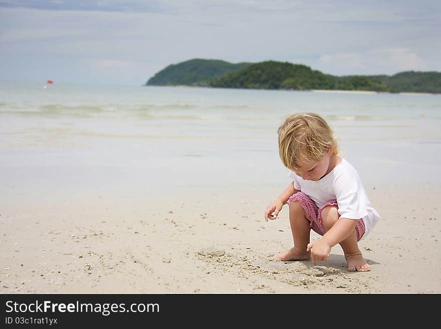 Child playing on beach