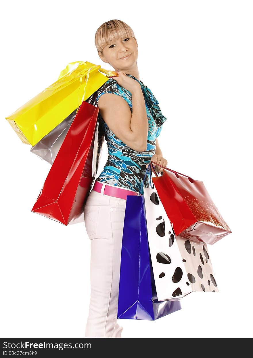 Portrait young adult girl with colored bags. Portrait young adult girl with colored bags