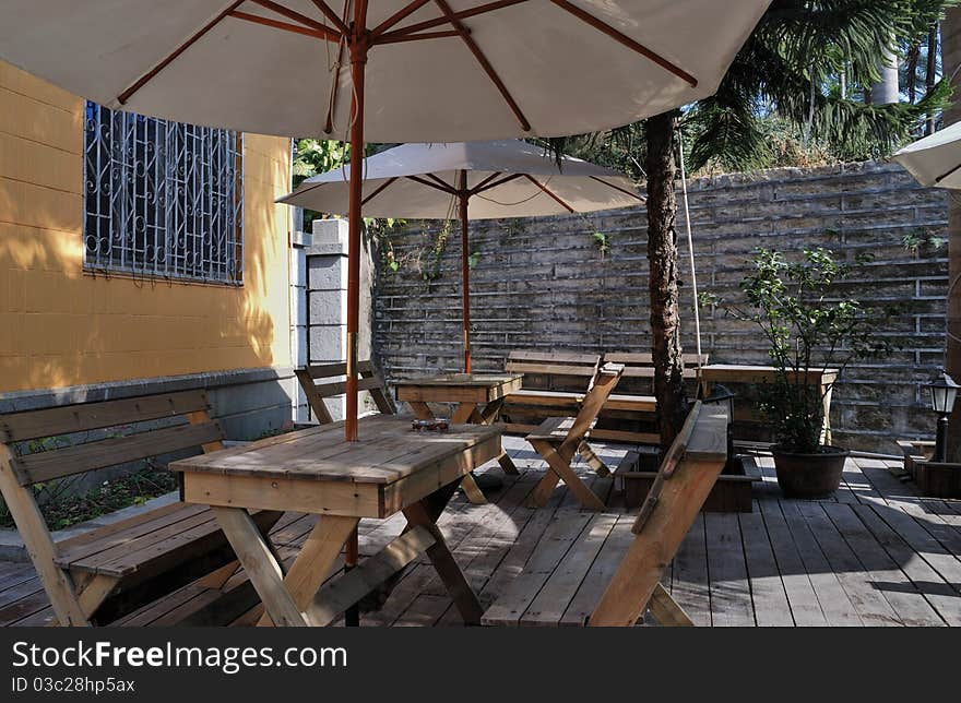 The dining table in the beautiful garden. The dining table in the beautiful garden