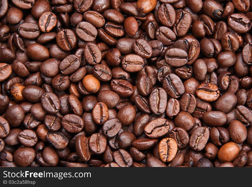 Dark roasted coffee beans texture, overhead, horizontal