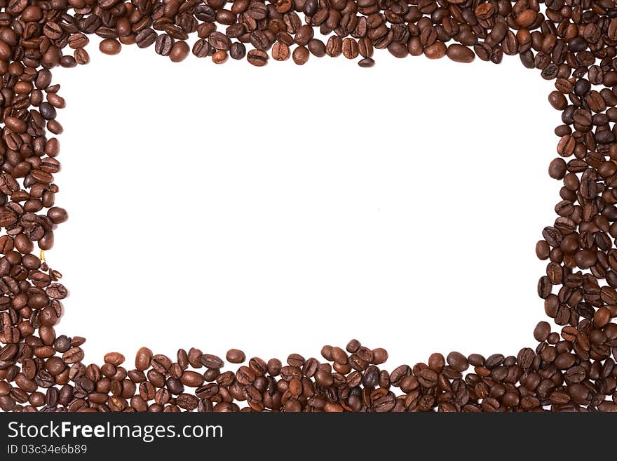 Frame made of coffee beans on a white background. Frame made of coffee beans on a white background