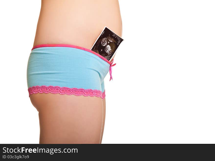 Pregnant belly in pink and blue panties on isolated background