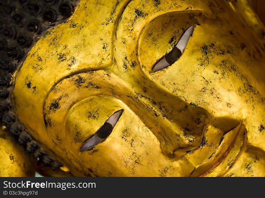 Closeup face of a Buddha statue