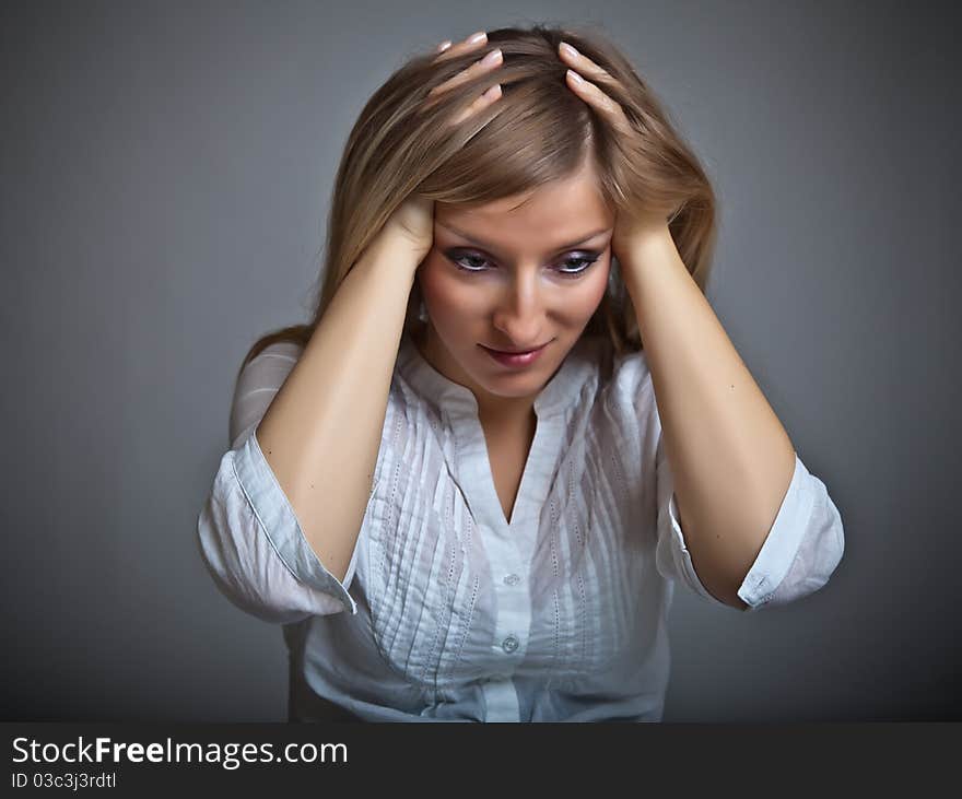 Woman holding pharmaceuticals on neutral bg. Woman holding pharmaceuticals on neutral bg