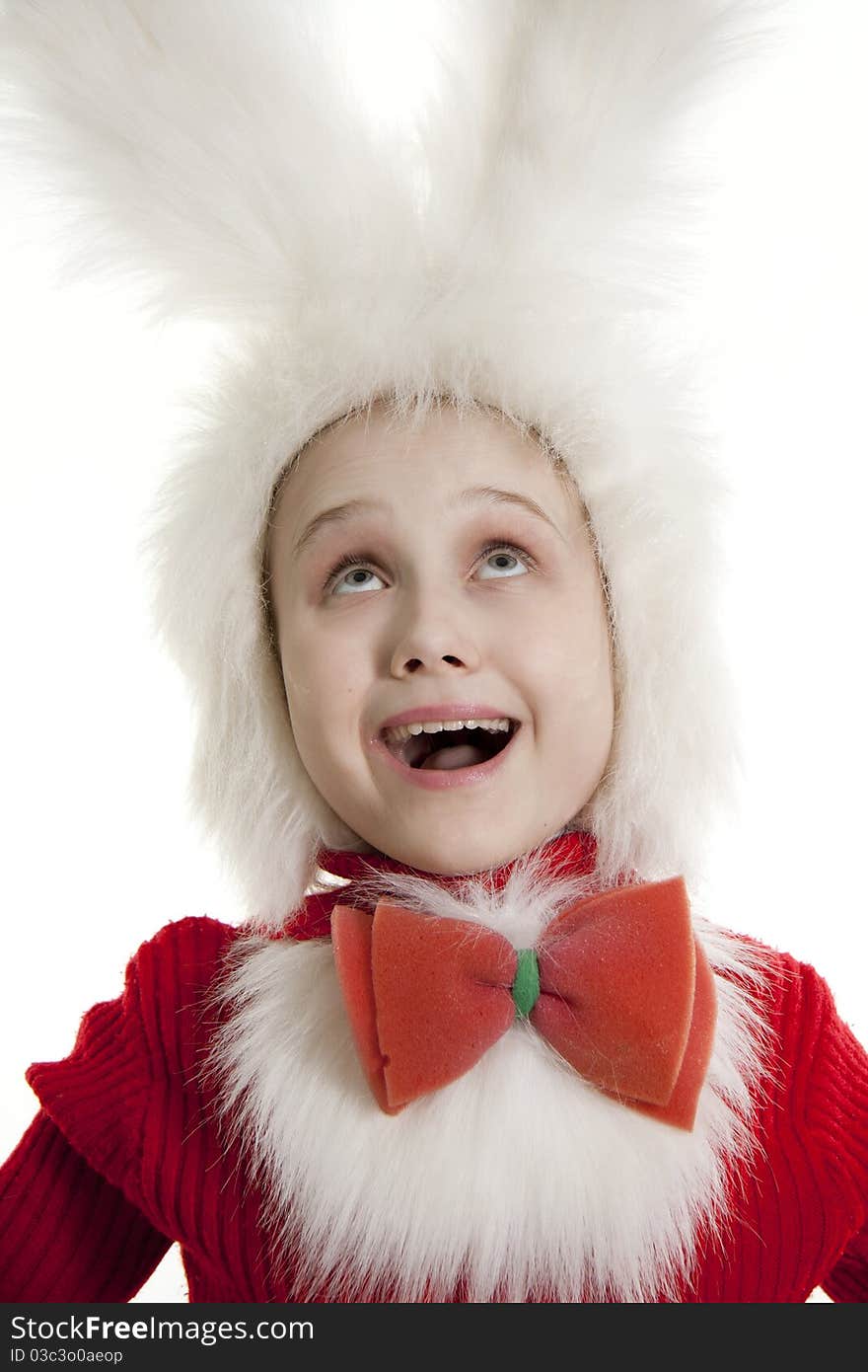 Сhild in a white downy bunny costume. Сhild in a white downy bunny costume.