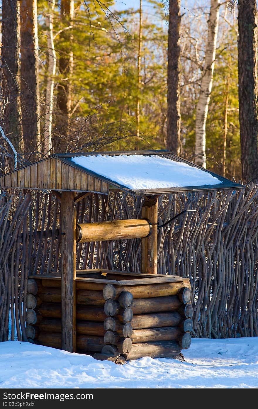 Winter nature. Old wood well. Winter nature. Old wood well