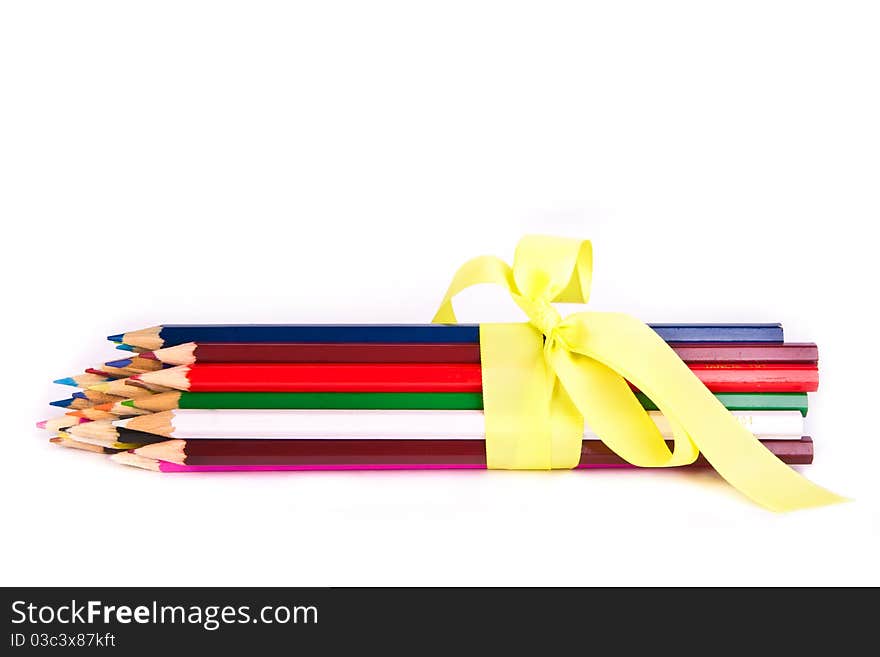 Bunch of colorful pencils across white. Bunch of colorful pencils across white