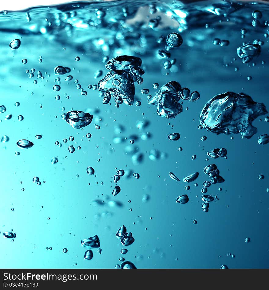 A blue fresh water with bubbles background