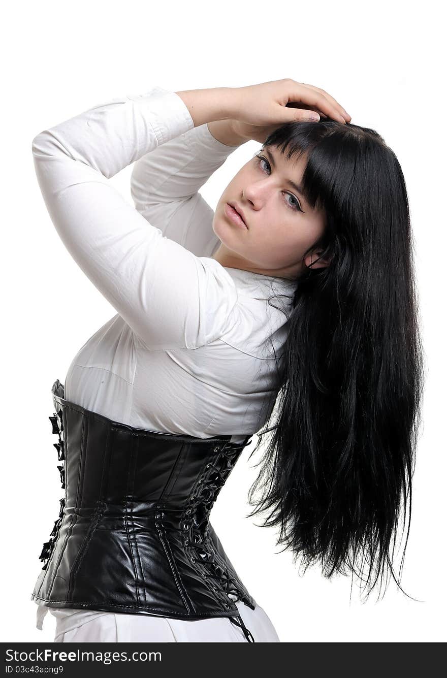 Woman in black corset and white dress isolated