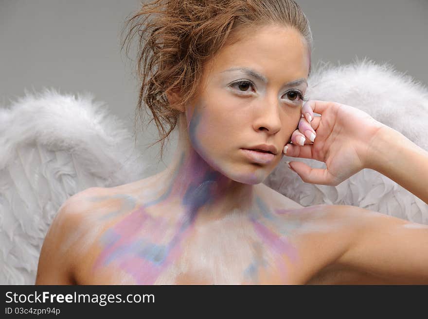 Brunette in angel costume