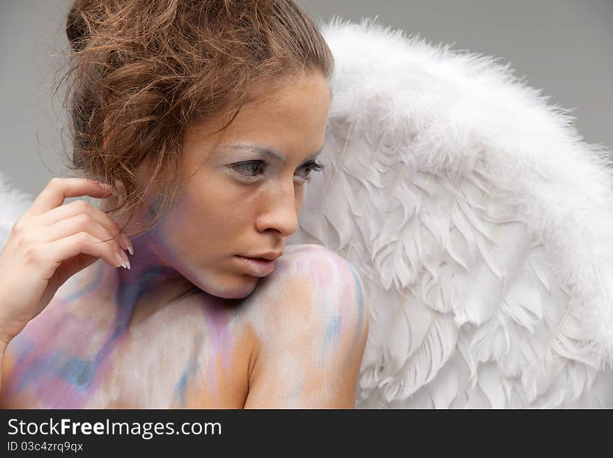 Close-up of graceful angel with wings