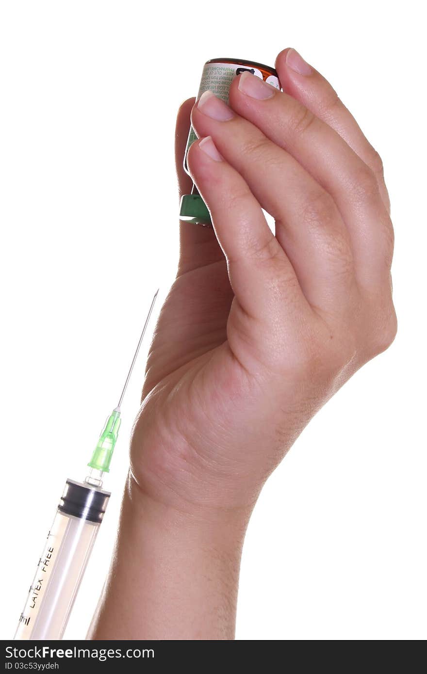 Nurse's hands at the brink of filling a syringe. Nurse's hands at the brink of filling a syringe