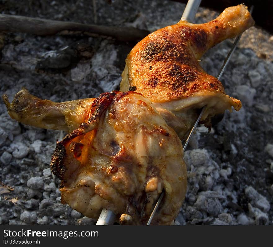 Picnic meat (chicken leg broiled on fire)