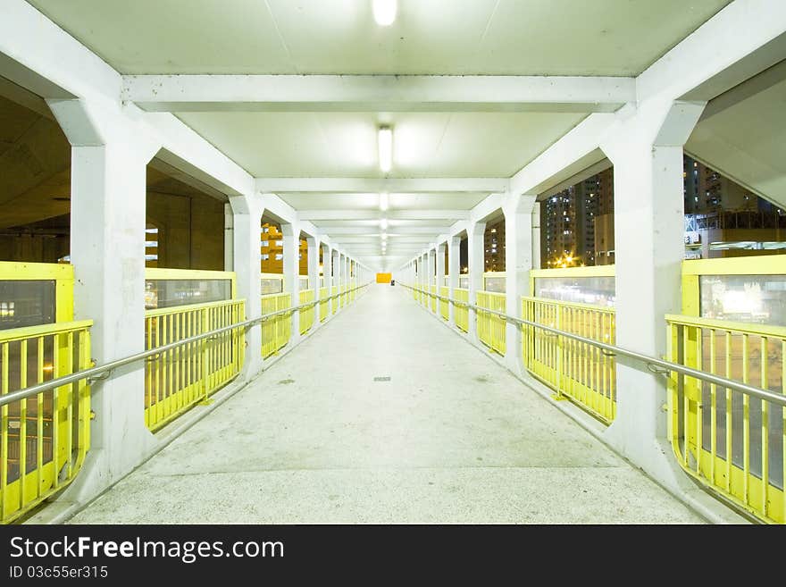 Footbridge with light trails in Hong Kong