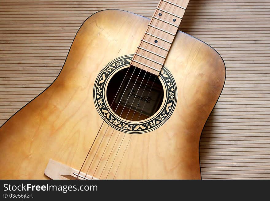 Guitar On A Bamboo Floor