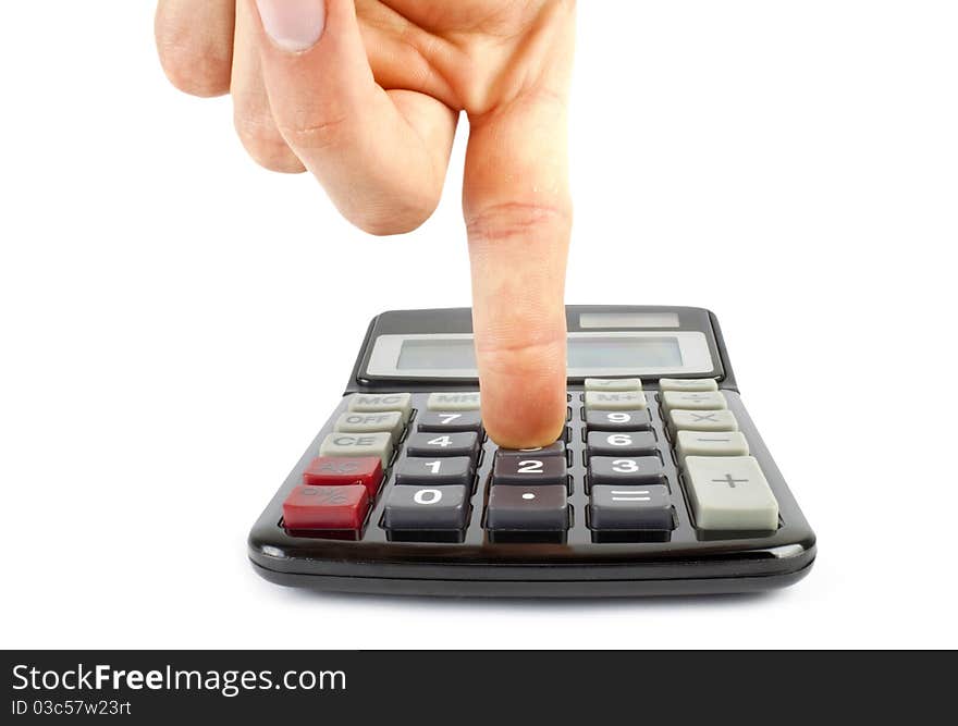 Male's finger pushing button on black calculator