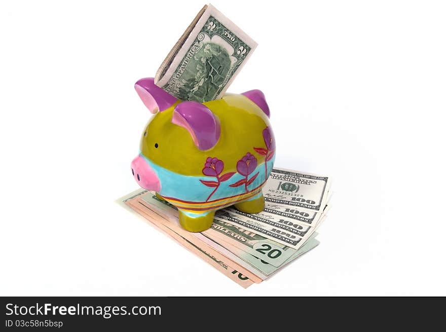 Colored piggy bank with lucky two dollars and money. Colored piggy bank with lucky two dollars and money.