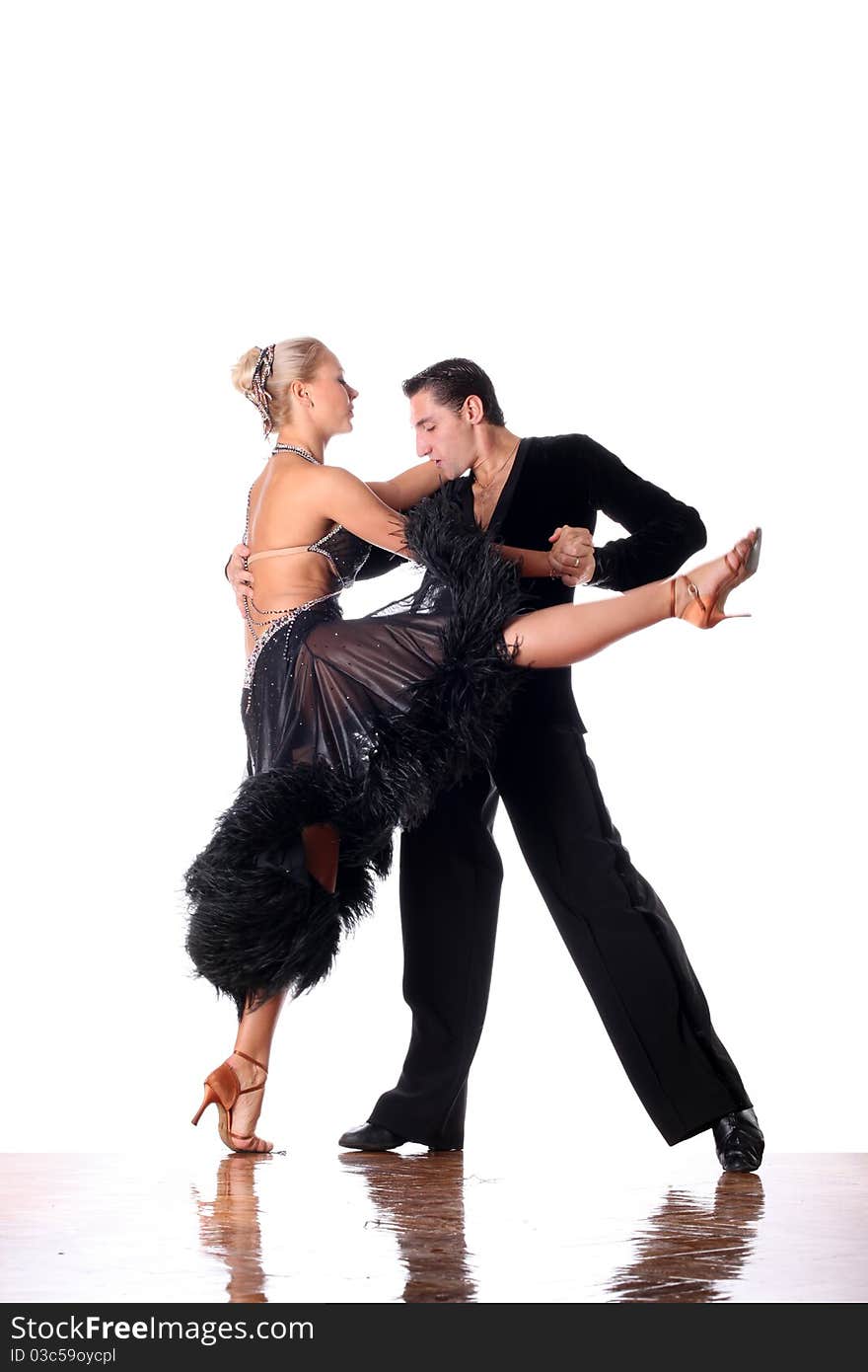 Dancers in ballroom against white background