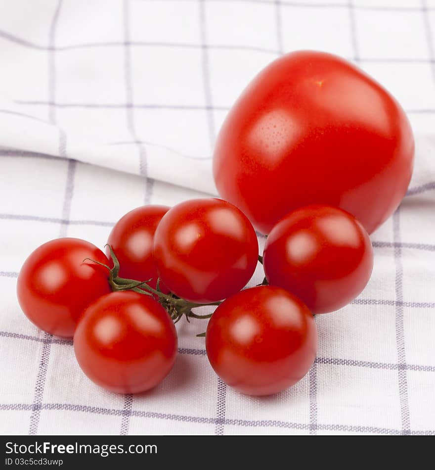 Some fresh and red tomatoes.