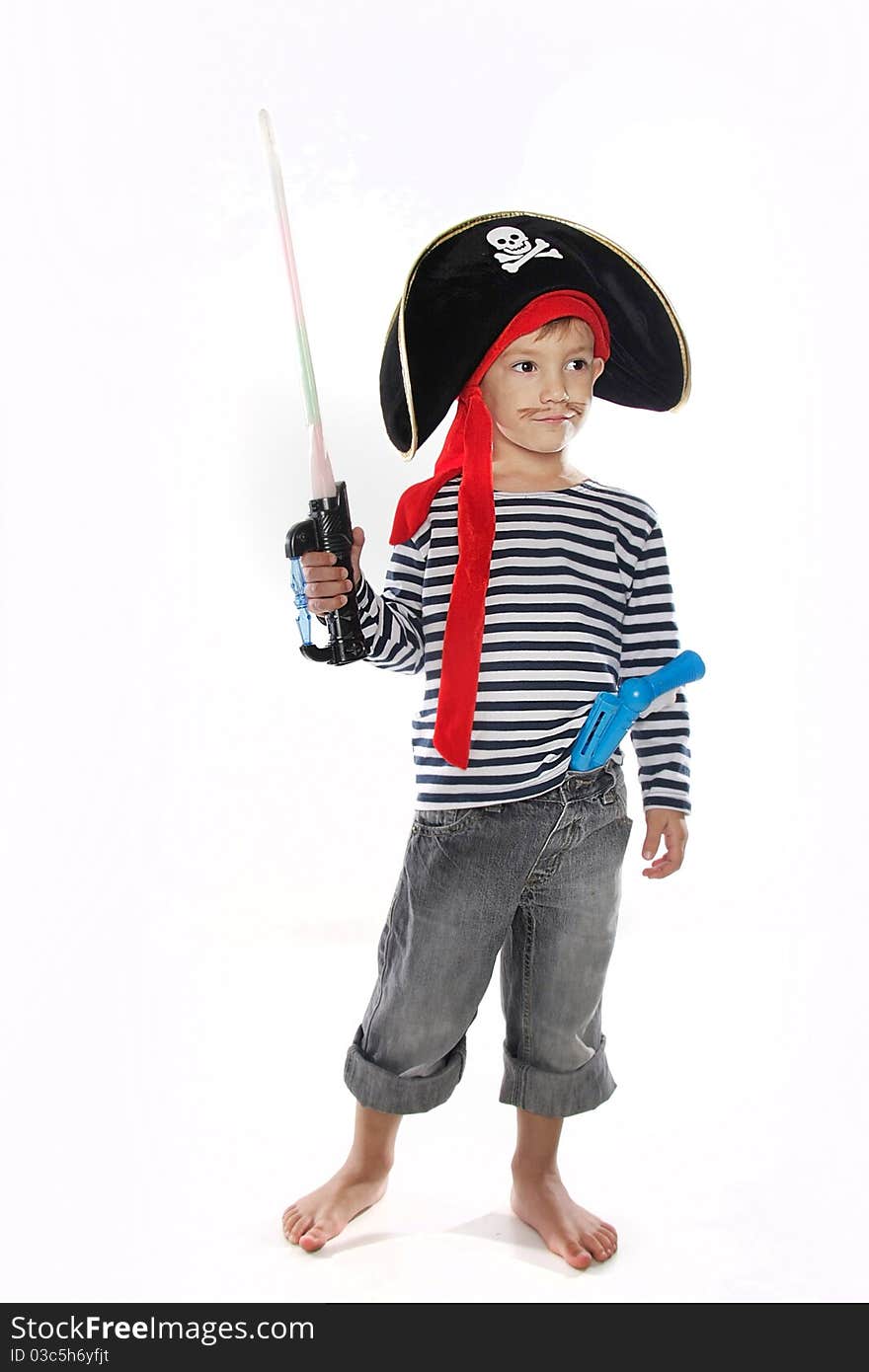 Studio portrait of young boy dressed as pirate