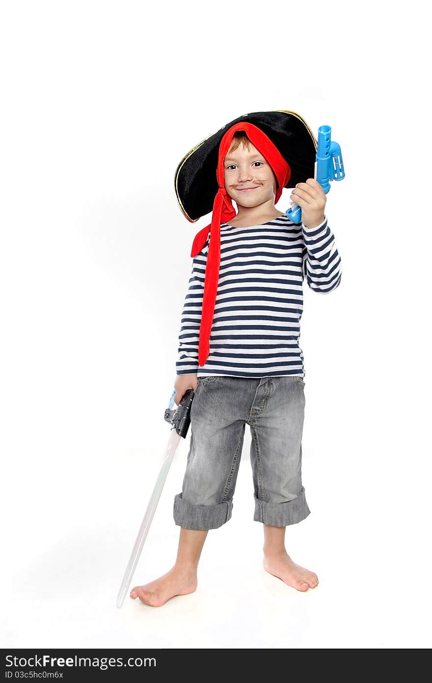 Studio portrait of young boy dressed as pirate