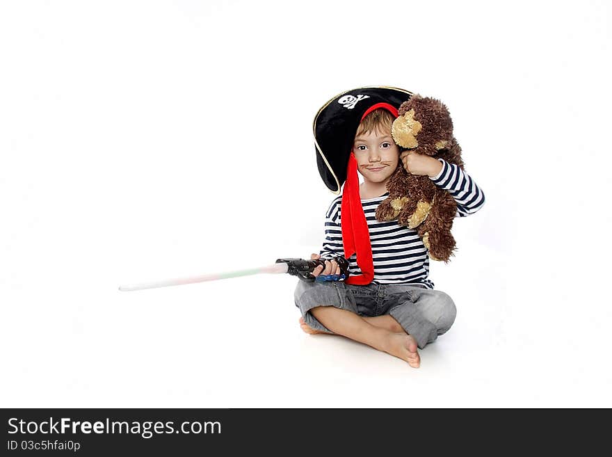 Studio portrait of young boy dressed as pirate