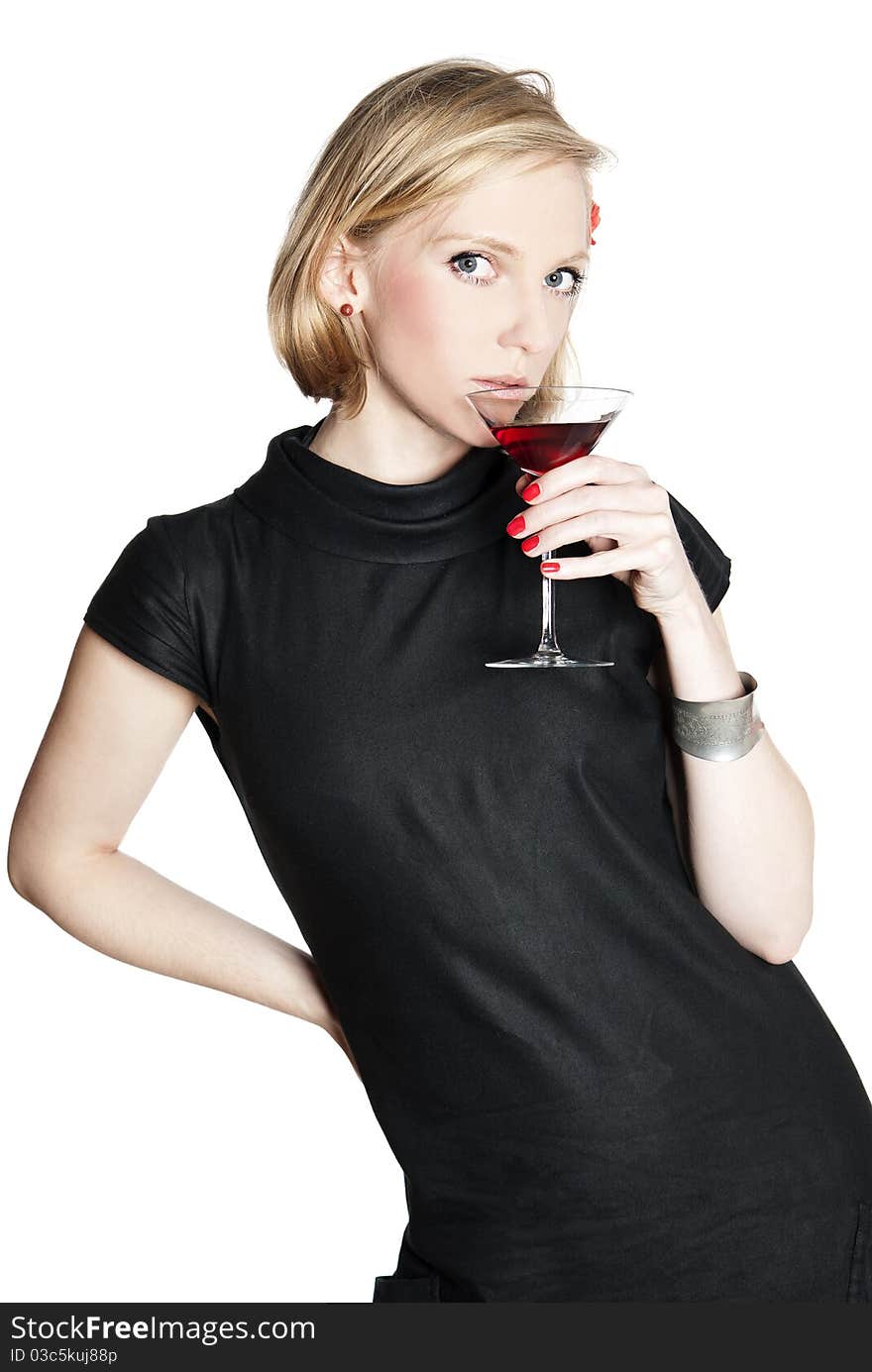 Young attractive woman in black dress holding a glass of red wine. Studio photo of blonde woman on white background. Young attractive woman in black dress holding a glass of red wine. Studio photo of blonde woman on white background.