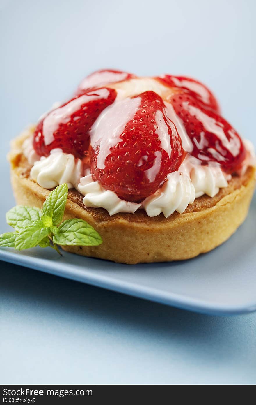 Tart with fresh cream and strawberries. Tart with fresh cream and strawberries