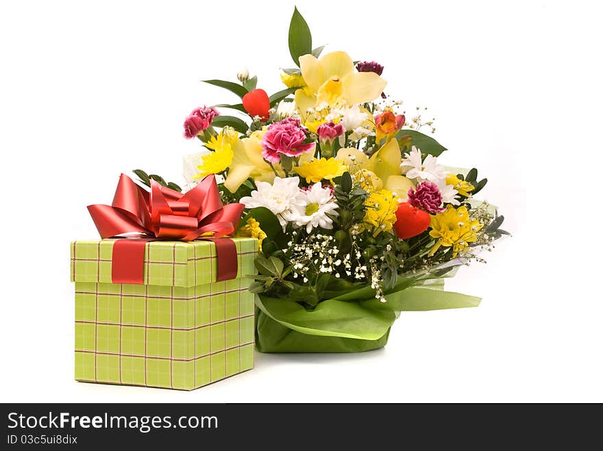 Magnificent bouquet and present box on a white