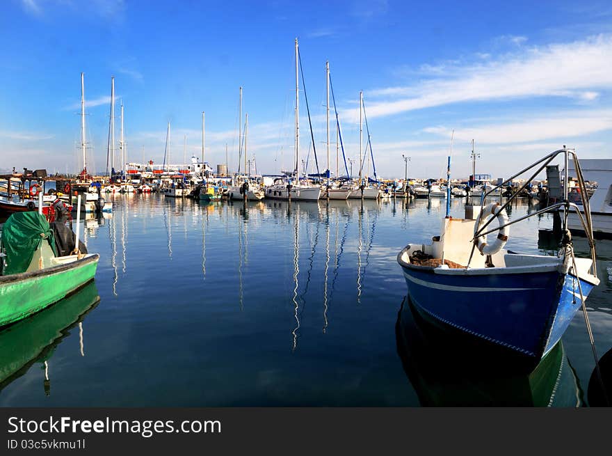 Cove yachts and fishing boats in the ancient city of Acre in Israel. Cove yachts and fishing boats in the ancient city of Acre in Israel