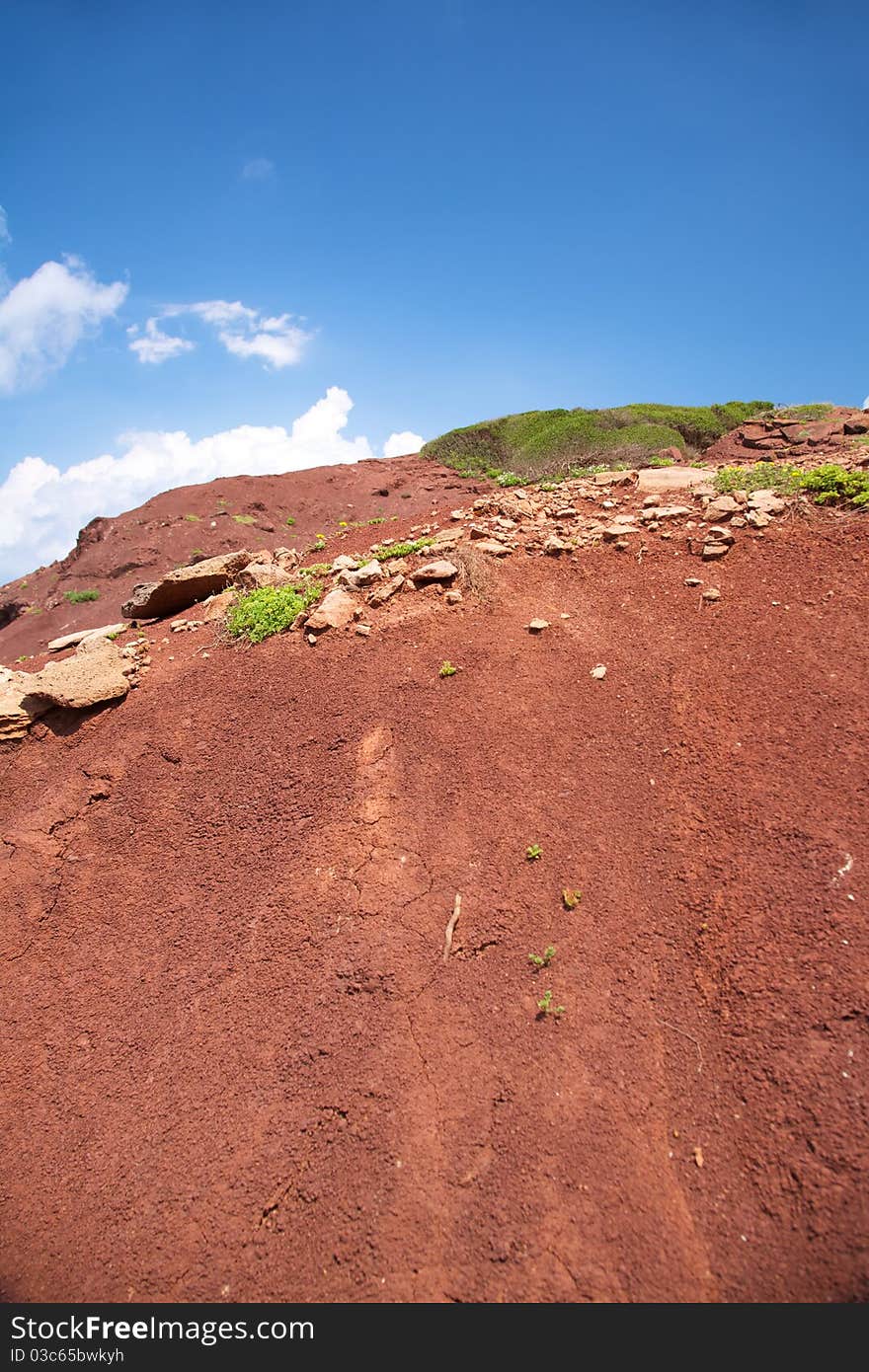 Blue sky over red earth