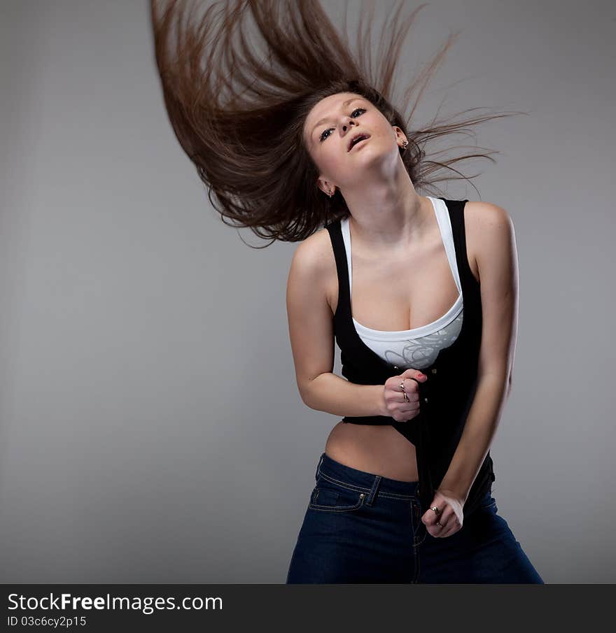 Attractive young woman dancing