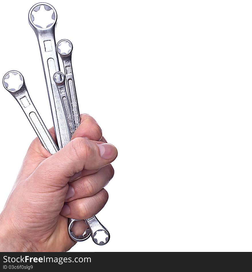 Spanners in a man s hand, isolated