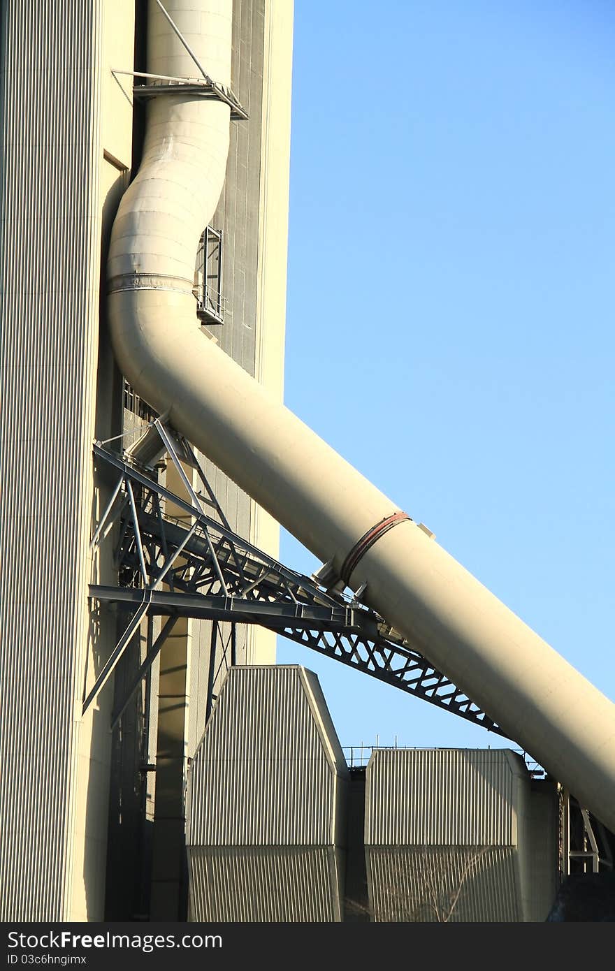 A close up shot of factory chimneys. A close up shot of factory chimneys